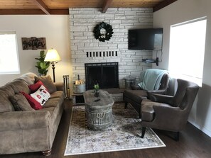 Smart TV, fireplace, DVD player, books