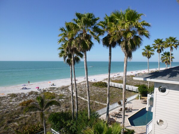 On the beach, sun loungers, beach towels
