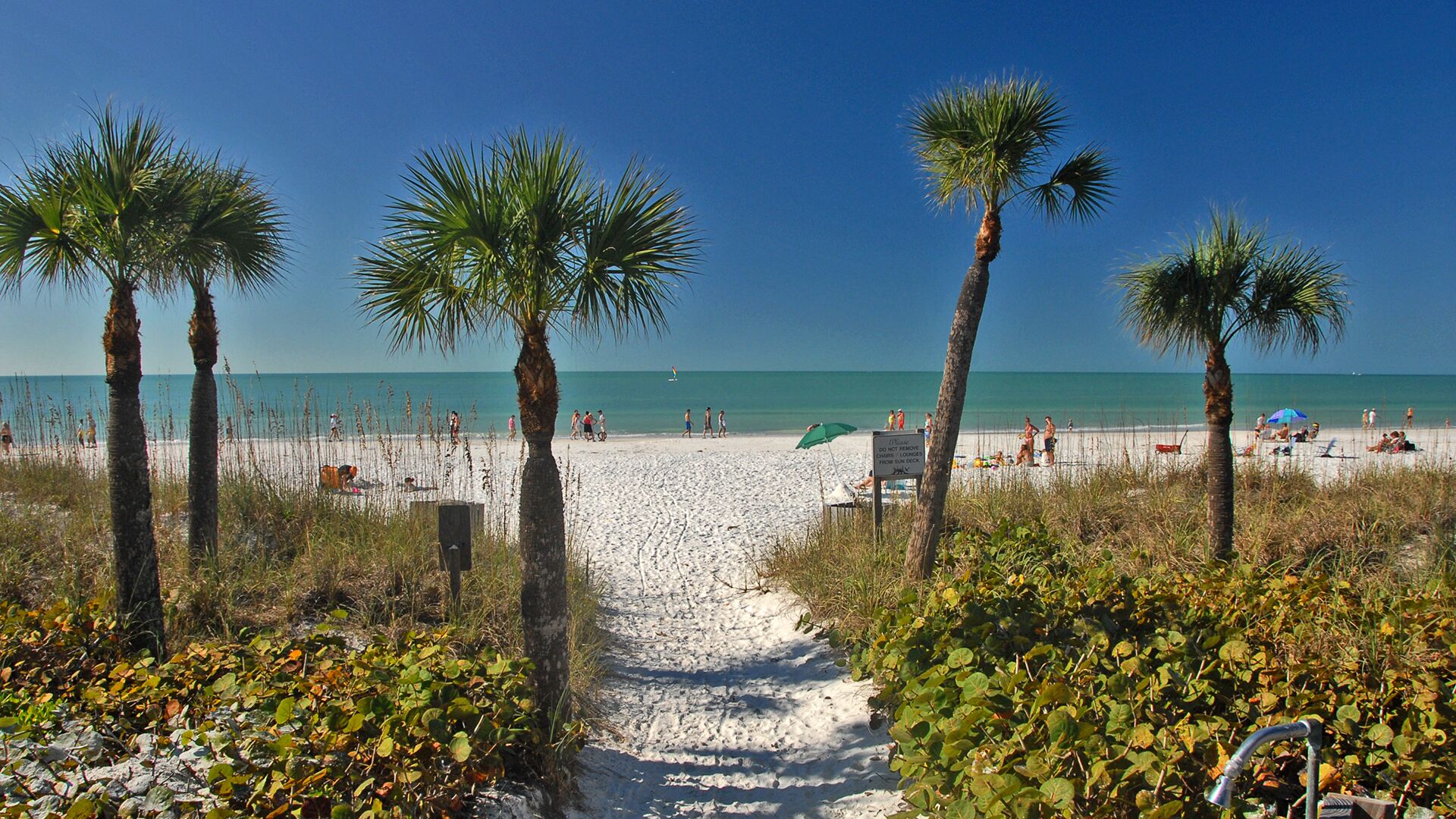 On the beach, sun loungers, beach towels