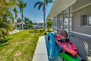 Relax in a serene outdoor space with a well-maintained lawn and tranquil views.