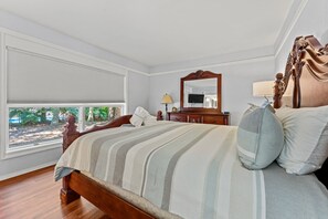 Lower-level King Suite | King bed, private bathroom, and Smart TV