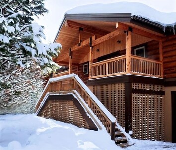 Grand front entrance with majestic mountain views.