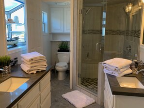 Hair dryer, towels, soap, toilet paper