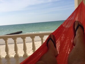 On the beach, sun-loungers, beach towels