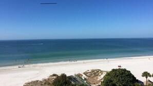 A beach with clear skies, a sandy shore, and a few people. - Fantastic Gulf View! On the beach! 3 Bdrms, 3 Baths, Great Pool and Hot Tub (Redington Shores)