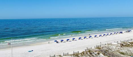 On the beach, sun-loungers, beach towels