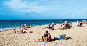 A crowded beach with people sunbathing and swimming. - Another Slice Of Paradise At Hampton Beach (Hampton)
