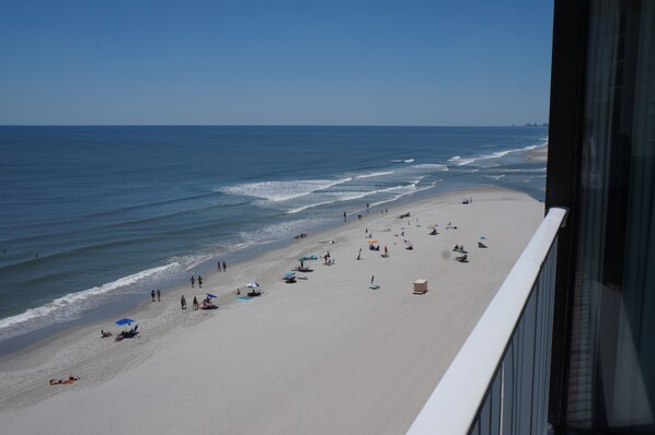 On the beach, sun-loungers, beach towels