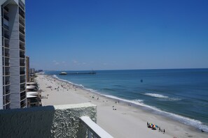 On the beach, sun loungers, beach towels