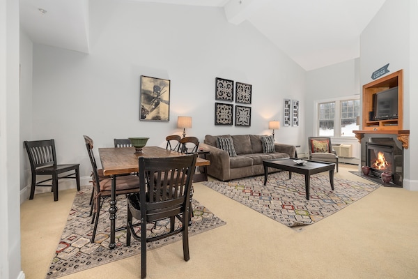Landmark Condo! Living Room with Fireplace and Slope Views
