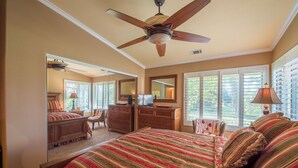 A bedroom with a large bed, a ceiling fan, a dresser, a mirror, and a window with blinds. - Single Story Condo, All New w/BBQ at Blacklake w/3 Golf Courses (Nipomo)