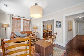 Flat-screen TV, fireplace, books
