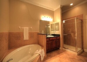 Combined shower/bathtub, hair dryer, towels, soap