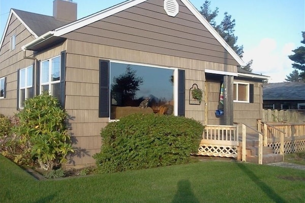 Warm, sunny deck at front of house.