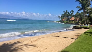 On the beach, sun loungers, beach towels