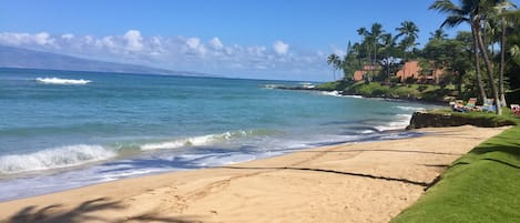 On the beach, sun loungers, beach towels