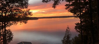 Lakefront Home with Amazing Sunsets, Private Dock & Firepit