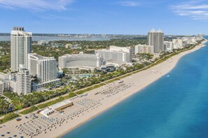 On the beach, sun-loungers, beach towels - Sorrento Ocean View Jr. Suite @Fontainebleau FREE Valet & Spa. No Resort Fees! (Miami Beach)