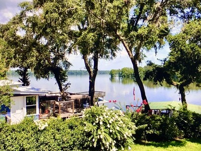 Charming lake cottage with character. Huge dock! Great views and seating areas!