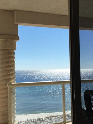 A balcony with a view of the ocean. - Located high enough to have a beautiful view, low enough to hear the waves! (Pensacola Beach)