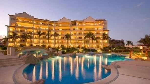 A multi-story hotel with a pool area. - Las Mananitas, Fifth Floor, 3 Bedroom Villa, Oceanfront, HUGE Balcony.  (San Jose Del Cabo)