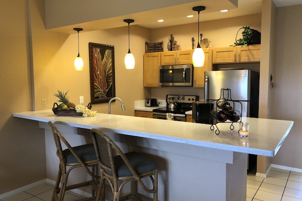 Renovated kitchen with built in bar