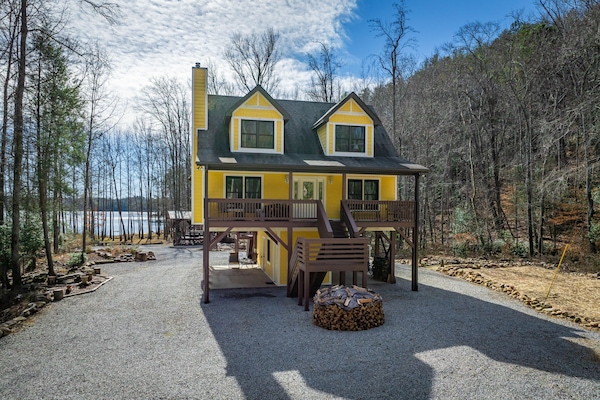 Main front view, see waterfront cove beyond the home. Dales Creek to the right.