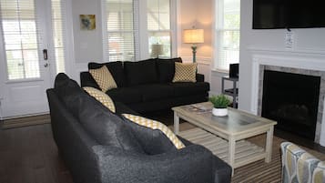 Smart TV, fireplace, DVD player, books