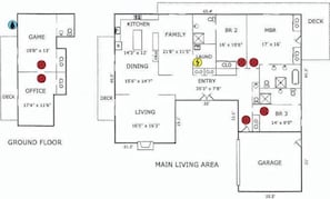 Planta baixa mostrando uma sala de jogos, escritório, sala de estar, cozinha, sala de jantar e garagem.