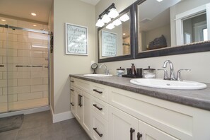 Combined shower/tub, hair dryer, towels, soap