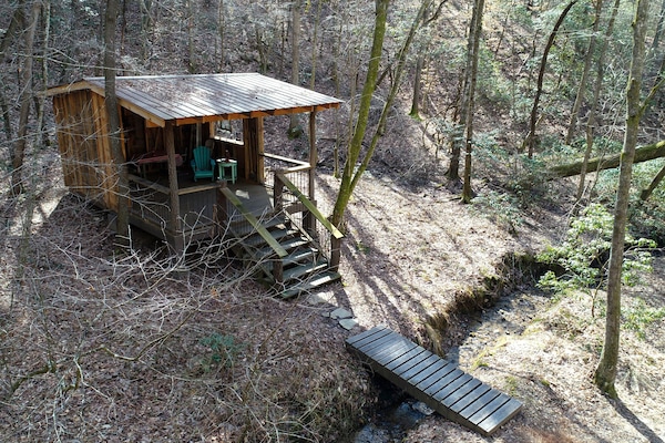 The shelter sits in the center of the acreage