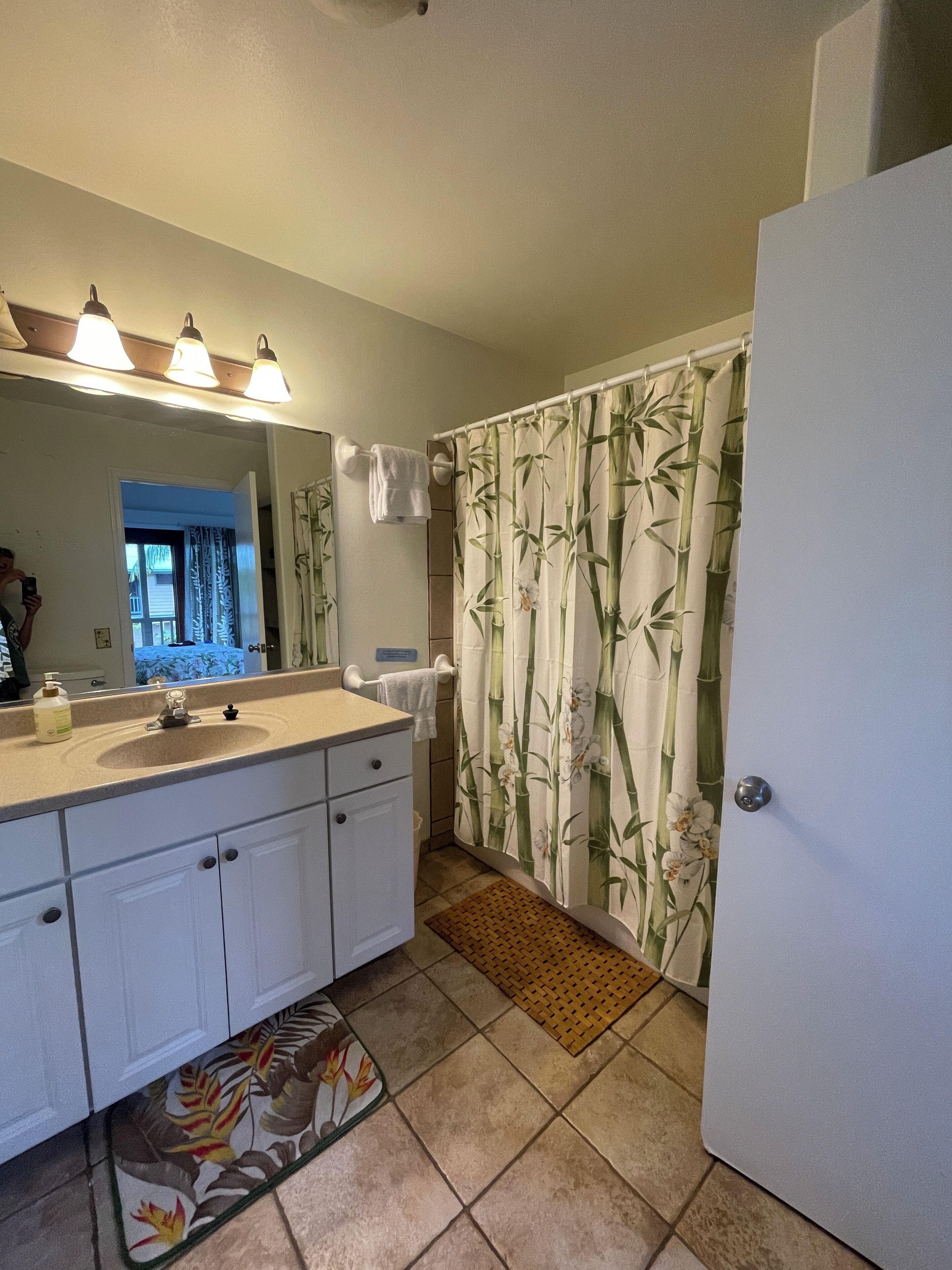 Combined shower/tub, hair dryer, towels, soap