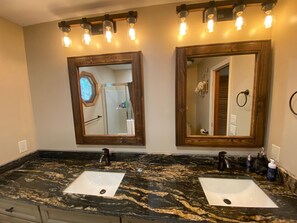 Combined shower/tub, hair dryer, towels, soap