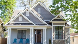 A two-story house with a front porch, a garage, and a small front yard. - Walk to some of Nashville's best shopping ,dining and parks! Great for families (Nashville)