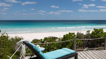 On the beach, sun loungers, beach towels