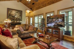 Flat-screen TV, fireplace, video games, stereo