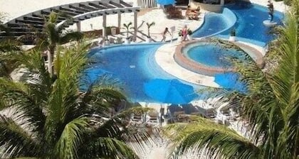 Huge true Beachfront condo, gated resort- full resort activities , 2 balconies