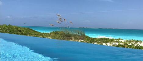 On the beach, sun loungers, beach towels