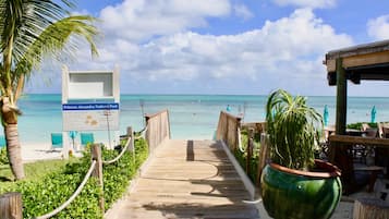 On the beach, sun loungers, beach towels
