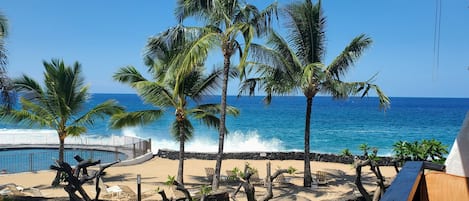 On the beach, sun loungers, beach towels