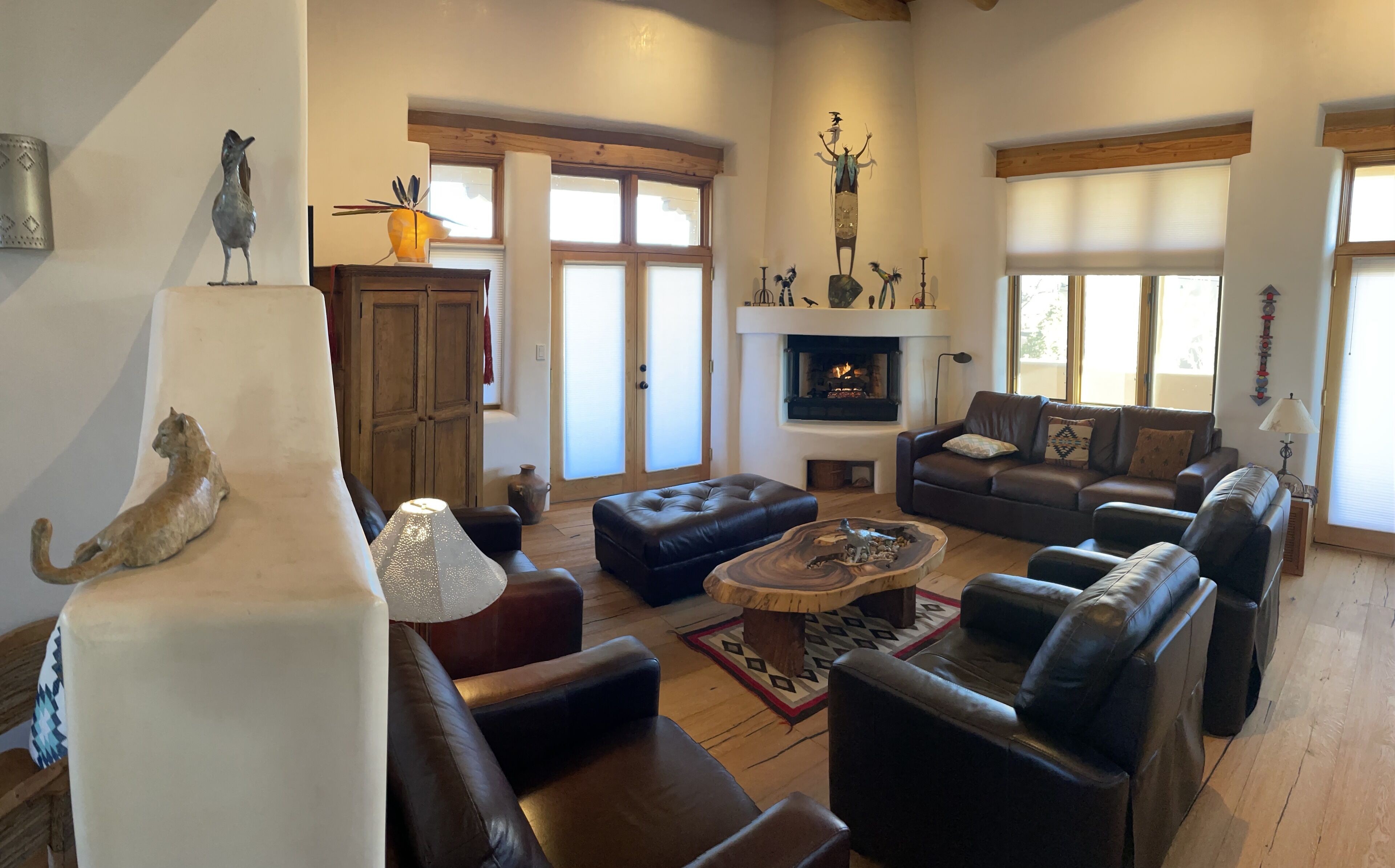 Worrell's "Ravens Fly Above Me" on a Laboradorite boulder in the great room