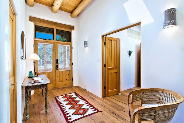 Two pair of French doors (right) and vestibule lead to the private master suite