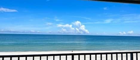 On the beach, sun-loungers, beach towels