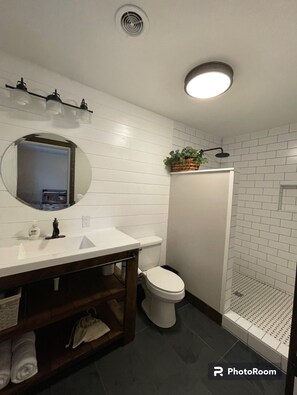 Bathtub, hair dryer, towels, soap