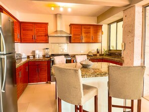 Fridge, microwave, oven, stovetop - Villas Altas Mismaloya Pent House 3 bedroom ocean & beach views (Puerto Vallarta)