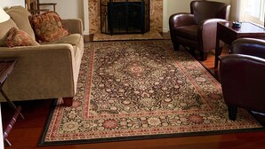 A living room with a fireplace, a sofa, a chair, and a rug. - Best North Napa Location, Close to Wineries & Restaurants (Napa)