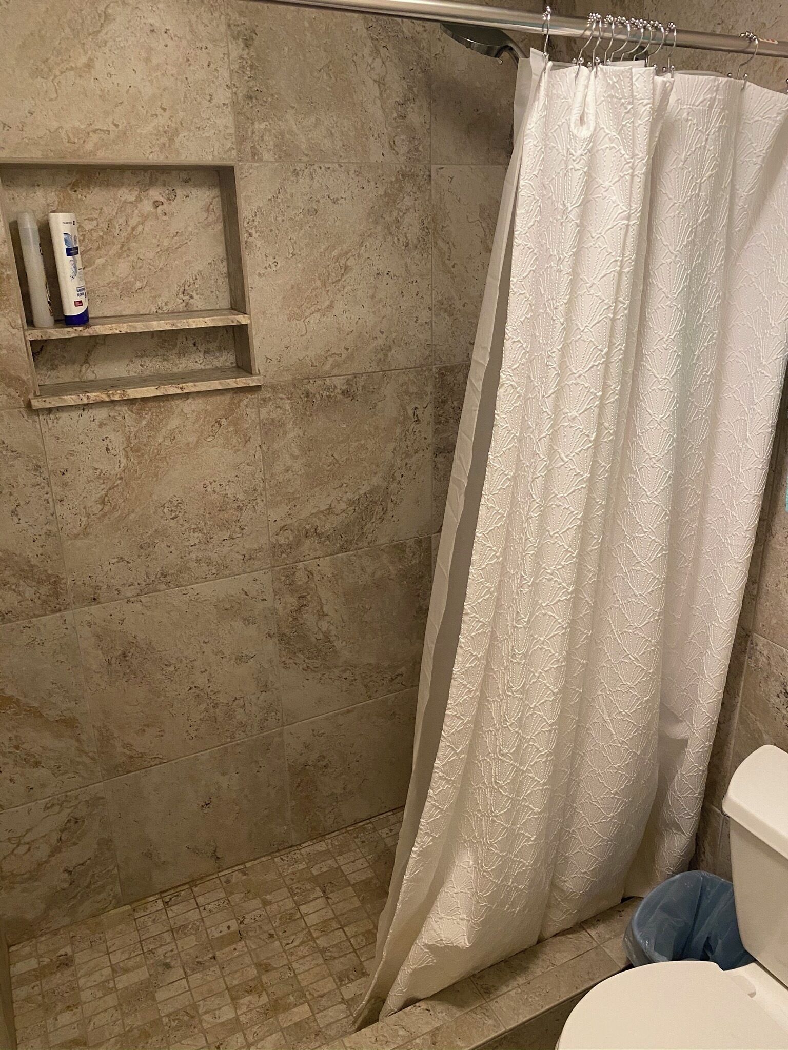 Combined shower/tub, hair dryer, towels, toilet paper