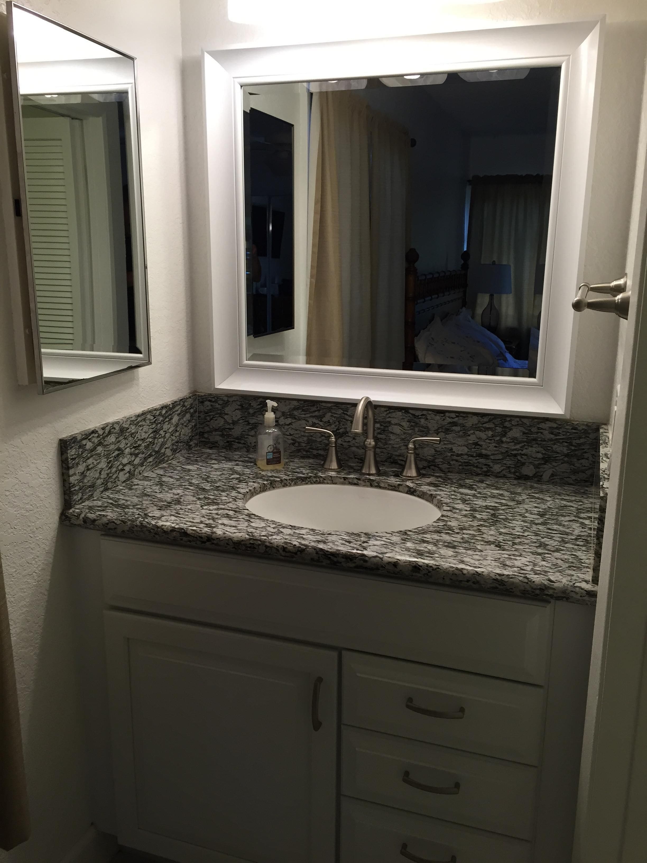 Combined shower/tub, hair dryer, towels, soap