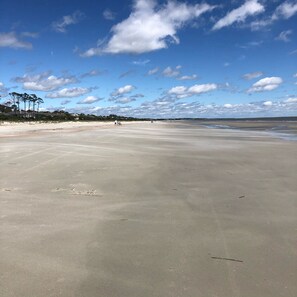 On the beach, sun-loungers