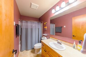 Combined shower/bathtub, hair dryer, towels, soap